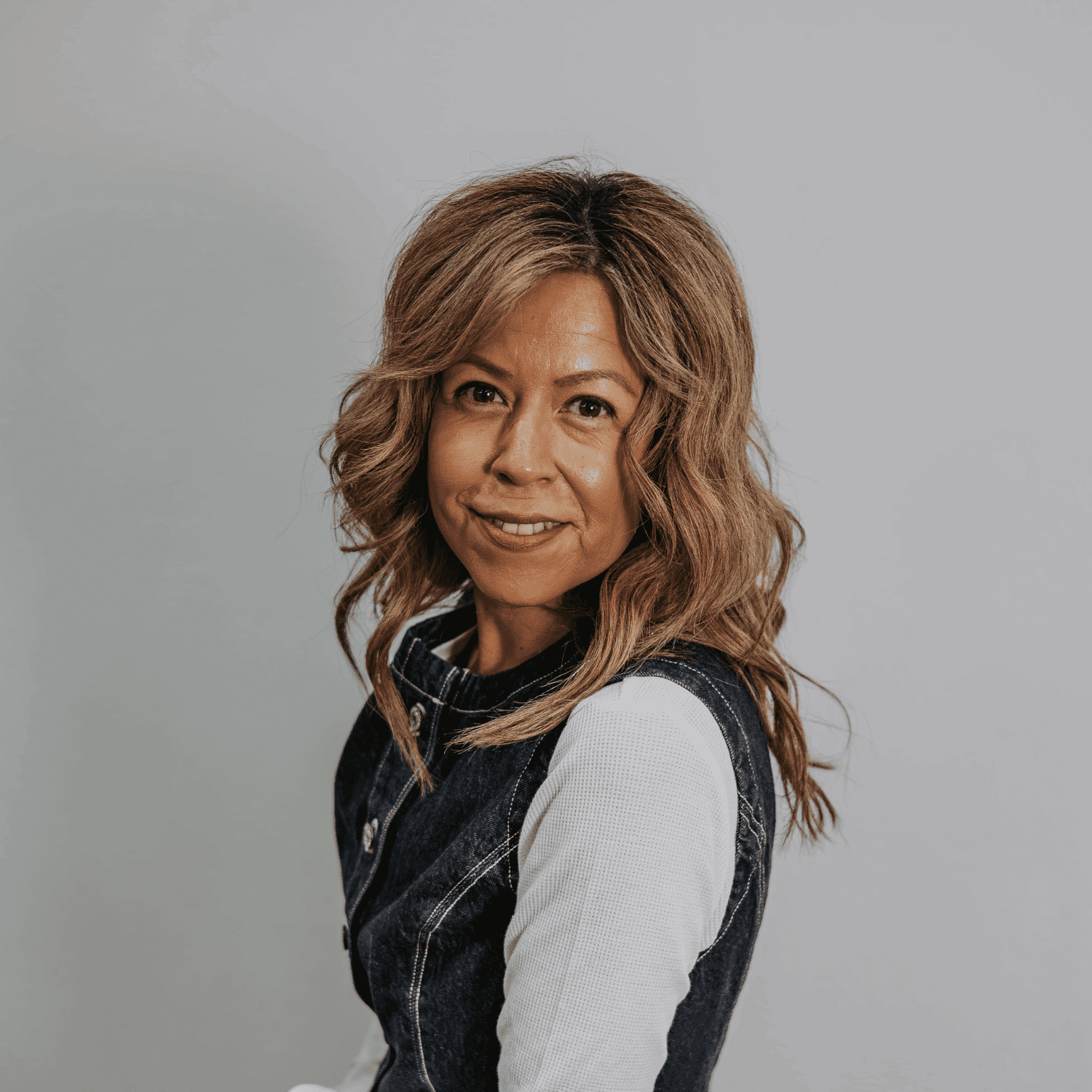 Portrait of Vanessa Longoria, a professional stylist at Craft Studio, showcasing their expertise and style.