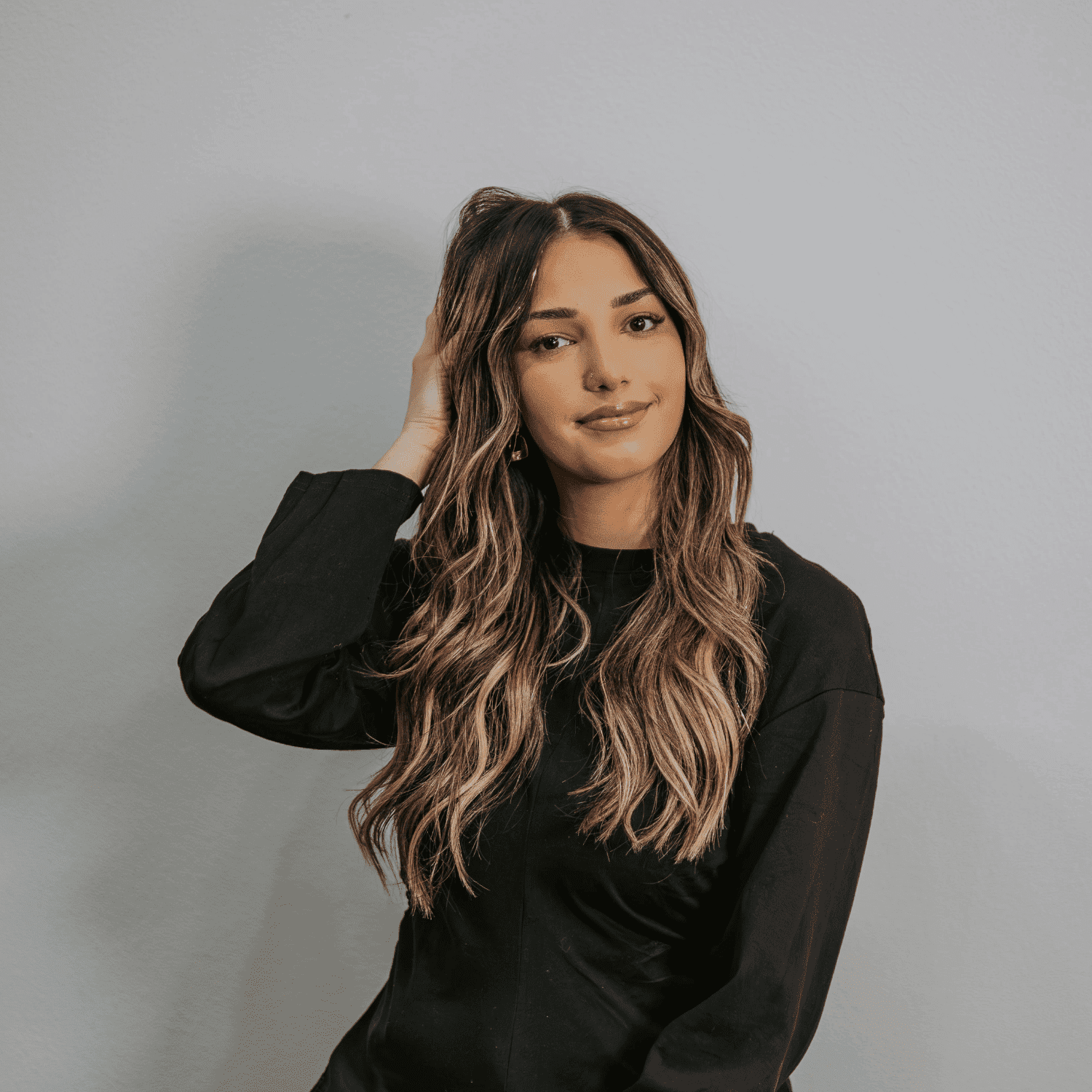 Portrait of Rana Shahpur, a professional stylist at Craft Studio, showcasing their expertise and style.