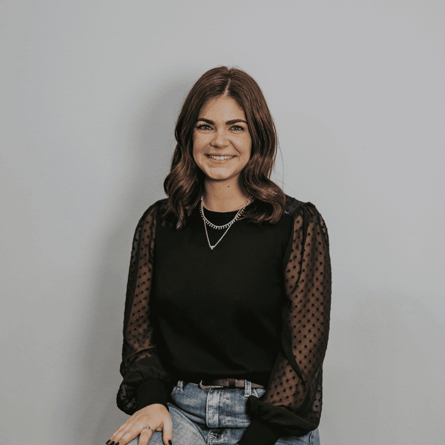 Portrait of Emily Finlay, a professional stylist at Craft Studio, showcasing their expertise and style.